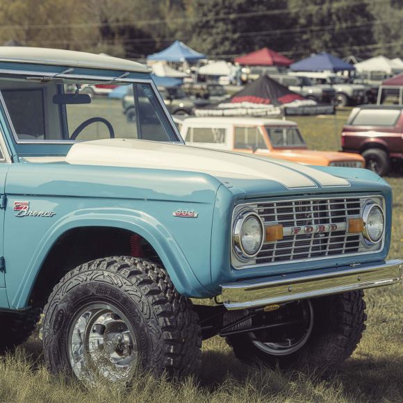 I am installing a supercharger on a coyote on a 74 bronco, how tall is the cowl especially towards the front approx 1' back from the front edge of the hood?