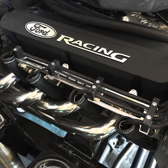 Does this kit come with mounting hardware to bolt up to valve cover? Or will I have to get my own?